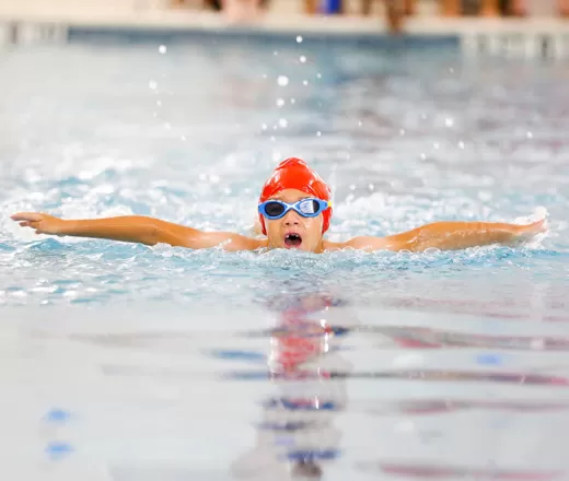 Competing in a Y swim meet